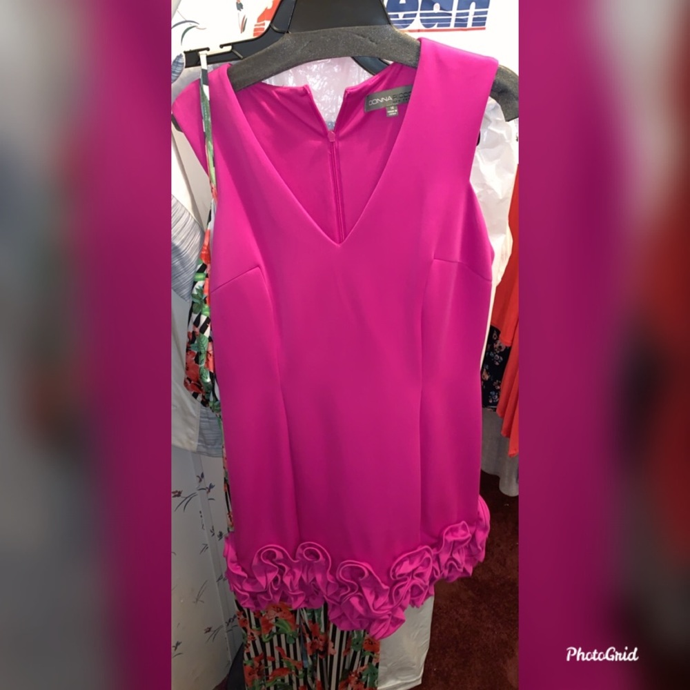 Fuchsia color dress with ruffles at the bottom